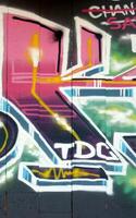 Colorful background of graffiti painting artwork with bright aerosol outlines on wall. Old school street art piece made with aerosol spray paint cans. Contemporary youth culture photo