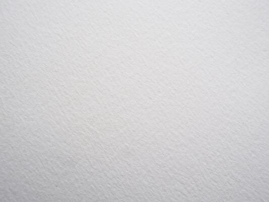 Grungy white watercolor paper backdrop with rough textured surface for design projects