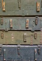 Soviet army ammunition stack of green crates with russian names of ammo type and category photo