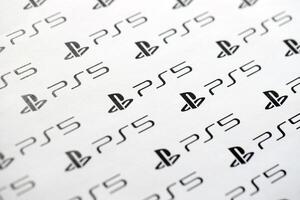 KYIV, UKRAINE - JUNE 26, 2024 Sony Playstation 5 console logo repeating many times on white paper background banner photo