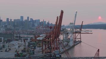 Aerial view of Port of Vancouver, harbour and mountains on the background video
