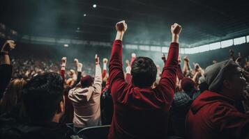 Cinematic shot of a cheering crowd on the sport event photo