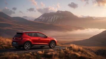 Seat Arona small red SUV car in european mountain landscape road at sunset photo