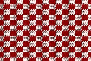 checkered background made of knitted texture in cozy red and white color vector
