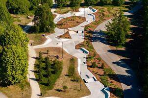New redesigned Victory park in Riga, Latvia with a pond and pedestrian walks photo