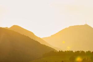 Alpine Sunset A Breathtaking View of the Majestic Mountains photo