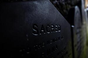 Sacred Inscription on the Tombstone, a Testament to the Dignity and Reverence of the Departed photo