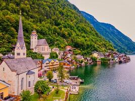 Beautiful mountain village Hallstatt in the Austrian Alps, Salzkammergut region, Hallstatt, Austria. Aerial drone view. photo