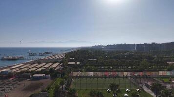 Flight over Turkish hotels. Architecture and beaches at sunset video