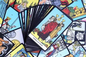 KYIV, UKRAINE - JULY 10, 2024 Tarot minor and major arcana cards of Rider Waite esoteric deck. Many tarot cards for fortune telling and esoteric actions photo