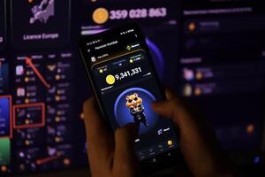 KYIV, UKRAINE - APRIL 20, 2024 Hamster Kombat telegram bot on smartphone screen. Hamster Kombat is a viral Telegram-based crypto game for earn HMSTR tokens by managing virtual crypto exchange photo