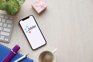 KYIV, UKRAINE - FEBRUARY 23, 2024 Jdate logo of famous dating website or app on iPhone display photo