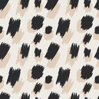 Black and beige spots with jagged edges form a seamless pattern with leopard print for modern decorative pillows, wrapping paper, fabrics. vector