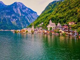 Beautiful mountain village Hallstatt in the Austrian Alps, Salzkammergut region, Hallstatt, Austria. Aerial drone view. photo