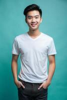 Vietnamese Underweight College Boy, Fresh, Crisp, White Oversized T-Shirt With Blank Space, Ideal For A Mockup for Magazine, Personal, Technology photo