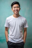 Indonesian Athletic College Boy, Chic, Polished, White Oversized T-Shirt With Blank Space, Ideal For A Mockup for News, Travel, Technology photo