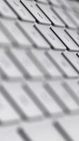 Close-up animation of white buttons of keyboard. Computer keyboard, animation video