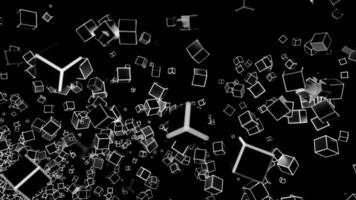 Abstract flow of cube silhouettes with white and black edges on a black background. Design. Flying 3D small figures. video