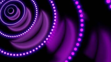 Abstract moving concentric rings of glowing spheres on a dark background. Design. Flowing round silhouettes of dots. video