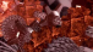 Glowing pixels. Motion.An orange-dark mosaic that moves in animation. video