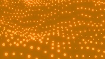 Abstract wavy background with moving golden particles. Design. Field of tiny glowing spheres on a yellow background. video