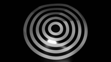fundo com alvo argolas. movimento. círculo do argolas em Preto fundo. circular argolas para alvo com ondas em superfície video