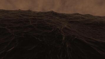 A bright rising seething ocean . Design. A huge black whale in animation that swims under huge waves. video