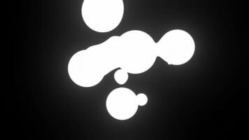Neon Biological Drops. Design. Glowing moving particles or molecules move on black background. Biological molecules with neon light under microscope video