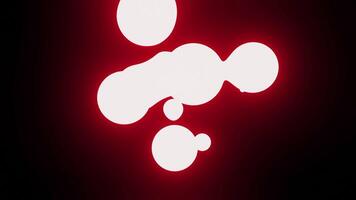 Abstract background with morphing red neon bubbles isolated on a black background. Design. Glowing spheres flying and getting stuck together. video