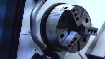 Close up of rotating fast metal detail. Motion. Spinning part of an industrial machine at the workshop. video