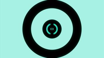 Light green and pink background . Design.Black large circles of different sizes move and narrow in abstraction. video