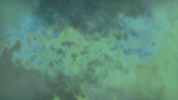Background with flashes in fog. Motion. Colorful fog with flashes of light. Shimmering spots in colorful fog or cloud video