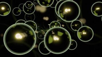 Black background. Design.Bright bubbles with white and yellow illumination of large size in the animation fly in different directions. video