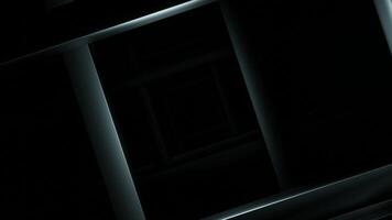 A dark tunnel. Design.An empty square-shaped corridor moving deep into abstraction video