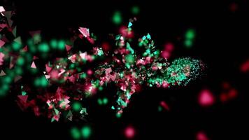 Colorful shimmering particles move in stream. Design. Stream of bright shining confetti on black background. Glitter and reflection from shimmering confetti video