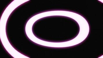 Abstract transforming neon pink rings isolated on a black background. Design. Endlessly bending and disappearing circles. video