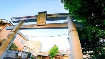 Fukumori Inari Shrine, a shrine in Aoto, Katsushika Ward, Tokyo, Japan It is located along the Nakagawa River, and unusually, the entrance is not ascending but descending. photo
