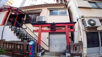 A small shrine in the city.Hatchobori Imamura Saiwai Inari Shrine,a shrine in Hatchobori, Chuo-ku, Tokyo, Japan The date of its establishment is unknown, but it is said that it began when a certain photo