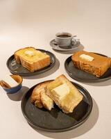 Roti Bakar is a typical grilled Indonesian sandwich, consisting of two slices of bread and filling, suitable to be served with Americano coffee. photo