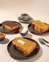 Roti Bakar is a typical grilled Indonesian sandwich, consisting of two slices of bread and filling, suitable to be served with Americano coffee. photo
