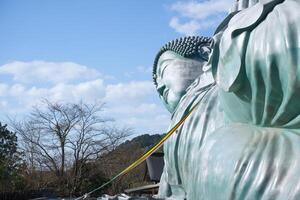 The Reclining Buddha Nehanzo is located in Nanzoin Temple in Fukuoka. It is claimed to be the largest bronze statue in the world photo