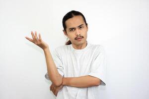 Upset and confused man, isolated on white background. photo