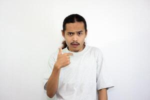 Upset and angry man with his hands on his waist. isolated on white background. photo