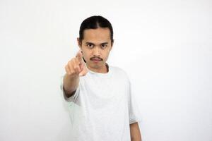 Upset and angry man with hand pointing to another direction, isolated on white background. photo