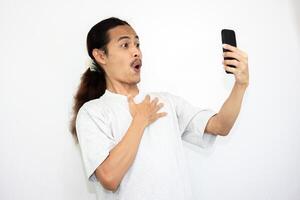 Asian man with various expressions while holding mobile phone. isolated in white background photo