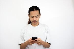 Asian man with various expressions while holding mobile phone. isolated in white background photo