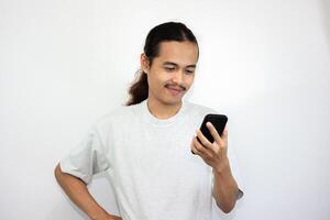Asian man with various expressions while holding mobile phone. isolated in white background photo