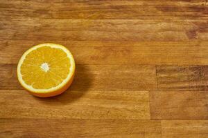 Slices of orange on a cutting board photo