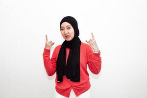 Young asian woman in hijab with angry expression. Isolated On White Background photo