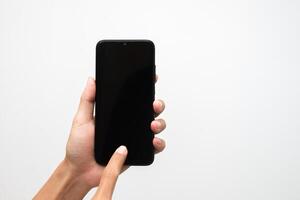 Man's hand holding a smart phone screen view from above. isolated in white background photo
